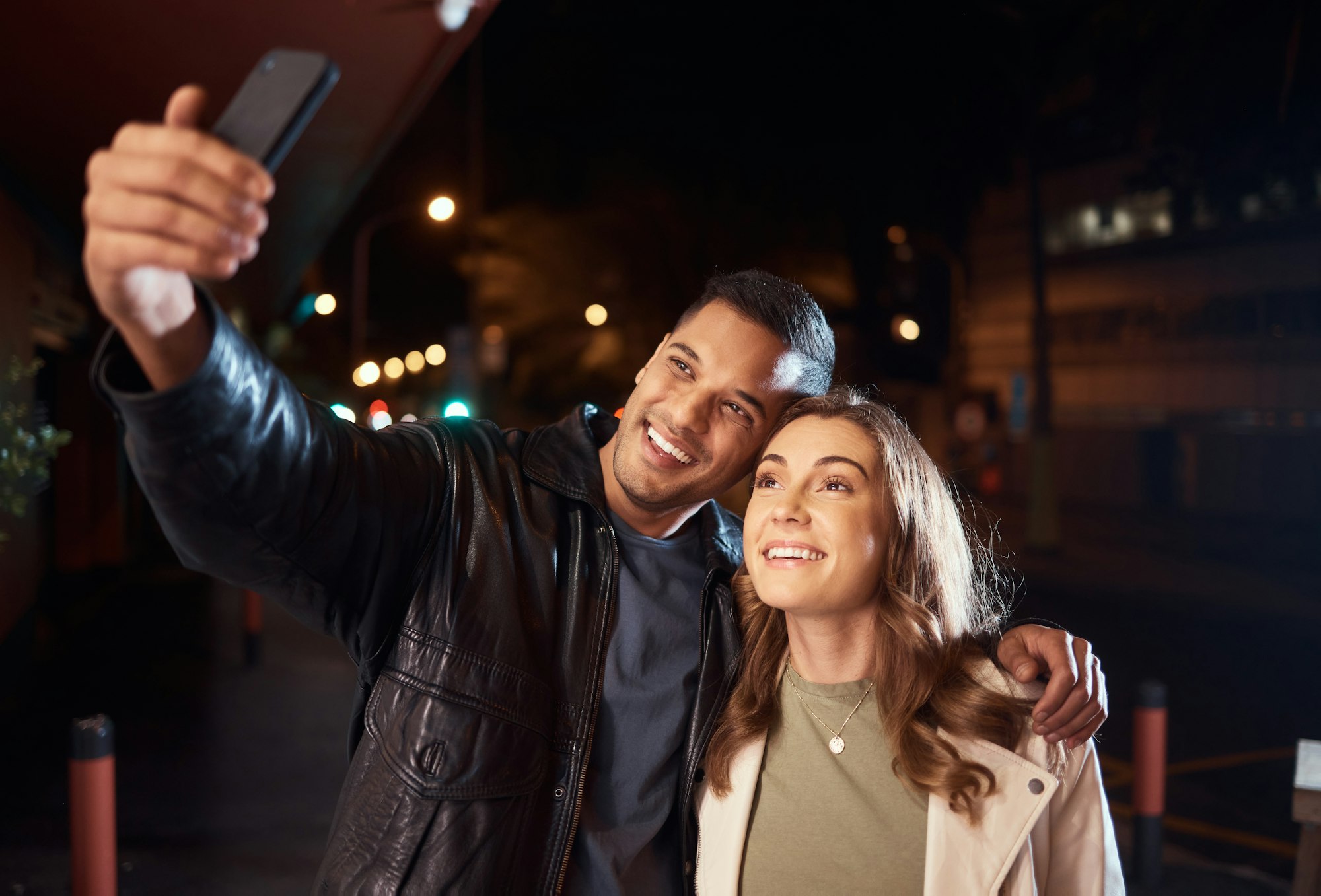 Couple of friends, phone or night selfie on city street or road for social media, profile picture o